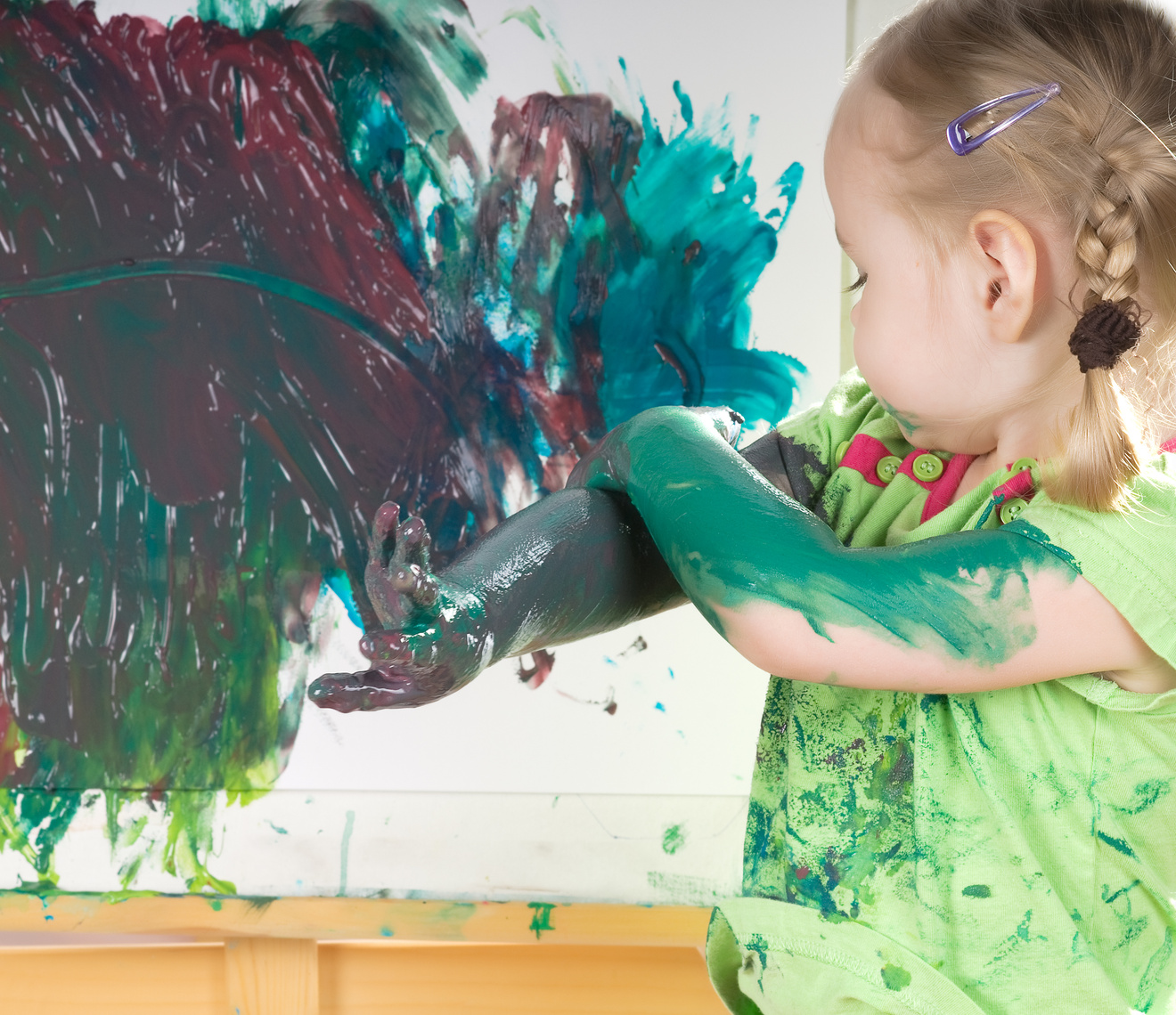 Child Painting on Canvas